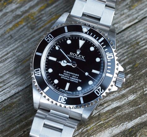 rolex submariner 14060m difference.